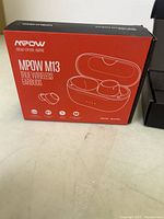 MPOW M13 True Wireless Earbuds box showing front design and key features.