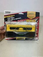 Front view of the Franklin Sensors ProSensor M210 professional stud finder in yellow and black color, sealed in original packaging showing the front and branding.