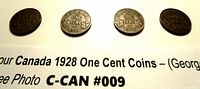 Top view of four Canada 1928 one cent coins showing the reverse sides with 'CANADA ONE CENT 1928'.