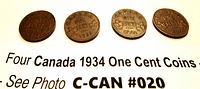 Four Canadian one cent coins dated 1934, showing back sides with denomination and maple leaves.