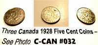 Photo showing three Canadian five cent coins dated 1928, displaying the reverse side with denomination and maple leaves.