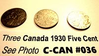 Three 1930 Canadian Five Cent Coins showing reverse side with '5 CENTS' denomination and maple leaf design.
