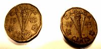Both 1943 Canadian five cent coins showing the reverse with Victory "V" symbol, torch, year, and maple leaves.