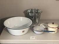 Group photo of vintage enamelware items and aluminum pail showing all included pieces