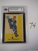 Front view of the 1959-60 Parkhurst Bert Olmstead hockey card enclosed in a graded plastic case showing Grade 4 VGE and card number 40.