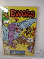 Front cover of Ewoks comic book issue #3 showing Ewok characters and a purple dragon-like creature on a yellow background.