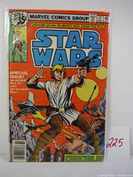 Front cover of the Marvel Comics Star Wars #17 comic book in protective sleeve, showing character Luke Skywalker on orange background with other Star Wars elements and text about the special issue.