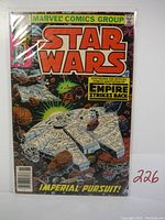 Front cover of Star Wars #41 comic with Millennium Falcon in asteroid field and characters R2-D2 and C-3PO