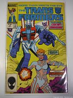 Front cover of The Transformers #9 Marvel comic book featuring Circuit Breaker and a Transformer character in blue and white against a yellow background.