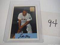 Front view of the 1996 Topps baseball card featuring Willie Mays in vintage New York Giants uniform, with clear protective plastic sleeve.