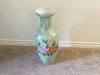 Tall green ceramic vase with crackle glaze and floral painting
