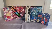 Full lot including two DropMix game boards, Confetti High Five toy and refills, drumstick pen, and gummy cupcake lip balm lip balm.