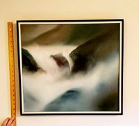 Black wood framed abstract misty landscape painting with measuring stick showing scale