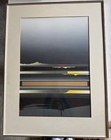 Full view of framed print showing mat, glass, frame and hanging wire