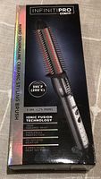 Conair Infiniti Pro Nano Tourmaline Ceramic Styling Brush in original box showing product details and features such as ionic fusion technology and heat settings