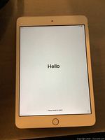 Front screen of the iPad Mini 3 showing the 'Hello' welcome screen after factory reset.