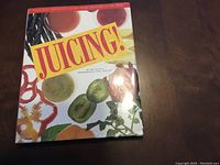 Front cover of the Juicing! book by Judi Olstein showing colorful fruits and juice images.