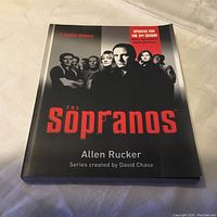 Front cover of The Sopranos book by Allen Rucker showing focus on the third season update and cast photo.