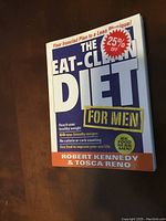 Photo of The Eat Clean Diet for Men book showing front cover details including promotional text and author names.