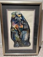 Front view of framed Godfrey N’Daba mixed media artwork