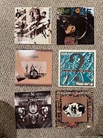 Front covers of all six vinyl records displayed in grid