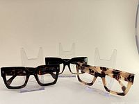 All three eyeglass frames grouped front view