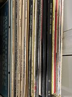 Spines of assorted jazz and big-band LPs on shelf