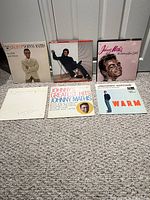 Front view of all six Johnny Mathis LPs showing album art and sleeve condition