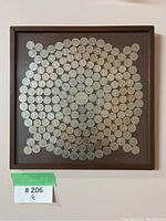 Front view of entire framed coin display