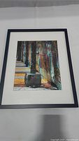 Framed street graffiti metallic art print showing graffiti-covered walls and concrete post.