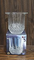 Single crystal champagne bucket on top of its original Nachtmann 24% Lead Crystal box.