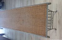 Top view showing the woven rattan surface of the table