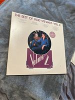 Front cover of The Best of Rod Stewart Vol. 2 vinyl album featuring Rod Stewart's image and album title, showing overall condition.