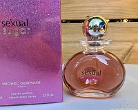 Bottle front and partial box showing branding