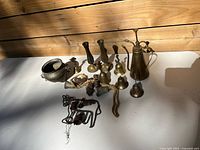 Group shot of entire brass lot on table