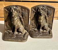 Front view of both brass German Shepherd bookends
