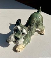 Front-angle view of porcelain Schnauzer figurine