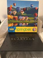 Lot with Scarface DVD and hot air balloon puzzle box front