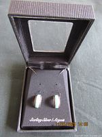 Earrings in their original black display box labeled Sterling Silver / Argent.