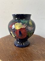 Front view of vase displaying orchid decoration