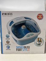 Front view of the Homedics Shower Bliss Foot Spa box showing branding, product image, and heat boost feature.