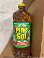 Single bottle of Pine-Sol cleaner showing front label with multi-surface cleaner, original scent, disinfecting claims.