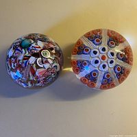 Both paperweights tops visible