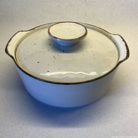 Angled view showing complete covered casserole dish with lid on