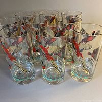 Full group of nine tumblers front view