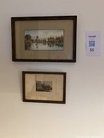 Both framed watercolour landscape paintings on wall, showing relative size and condition.