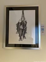 Framed original ink drawing showing six fish hanging, signed and titled, with silver frame and black matte border.