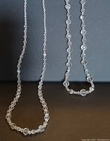 View showing both vintage faceted crystal bead necklaces.