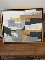 Front view of abstract contemporary painting with geometric shapes and mixed neutral colors.