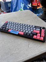 Top side of the mechanical keyboard showing mixed color keycaps and compact layout.